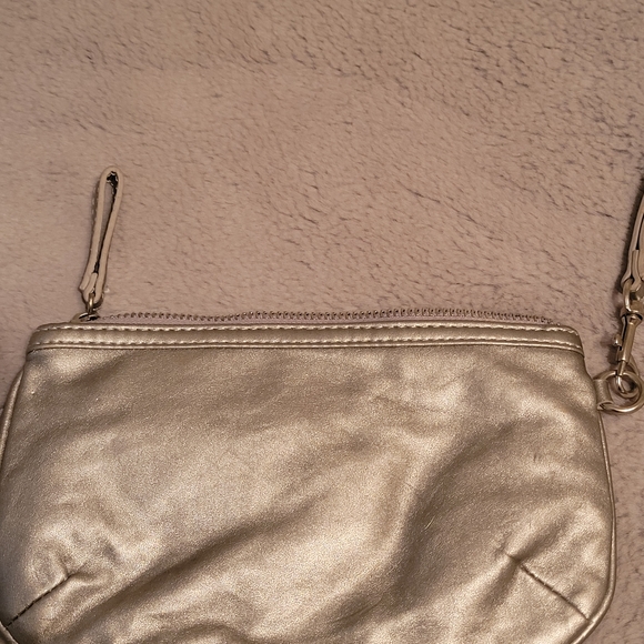 Candie's Silver Sequined Bow Wristlet - Picture 4 of 8